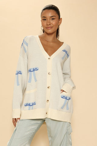 All over bow knit cardigan *Online Only* - Premium  at Lonnys NY - Just $64.68! Shop Womens clothing now