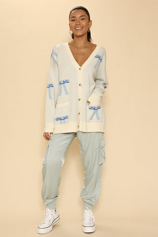 All over bow knit cardigan *Online Only* - Premium  at Lonnys NY - Just $64.68! Shop Womens clothing now