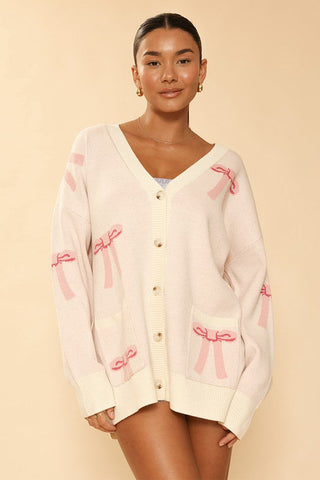 All over bow knit cardigan *Online Only* - Premium  at Lonnys NY - Just $64.68! Shop Womens clothing now