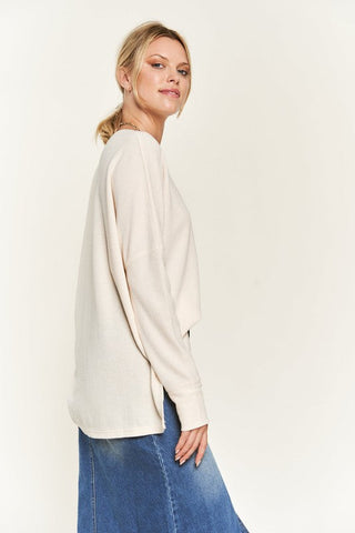 Button down side slit pullover knit top  *Online Only* - Premium  at Lonnys NY - Just $79.63! Shop Womens clothing now