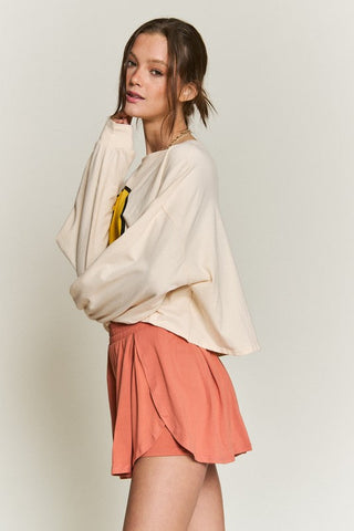 SMILEY FACE LONG SLEEVE CROP TOP *Online Only* - Premium  at Lonnys NY - Just $62! Shop Womens clothing now
