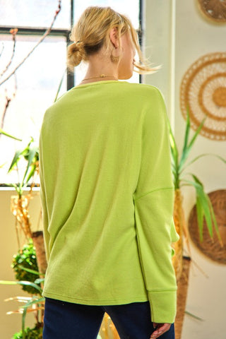 Button down side slit pullover knit top  *Online Only* - Premium  at Lonnys NY - Just $79.63! Shop Womens clothing now