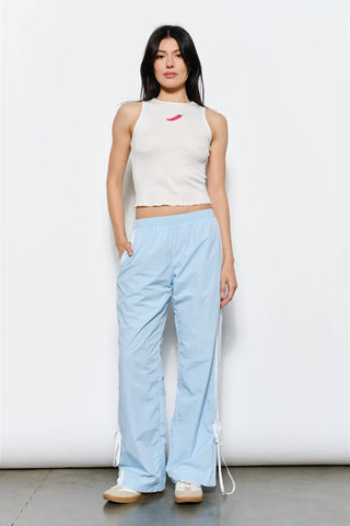 American Poet Dakota Bow Track Pants - Premium clothing at Lonnys NY - Just $74! Shop Womens clothing now