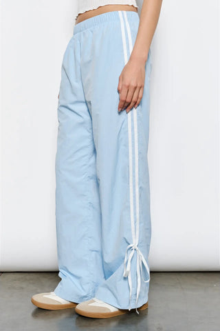 American Poet Dakota Bow Track Pants - Premium clothing at Lonnys NY - Just $74! Shop Womens clothing now