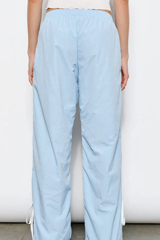 American Poet Dakota Bow Track Pants - Premium clothing at Lonnys NY - Just $74! Shop Womens clothing now