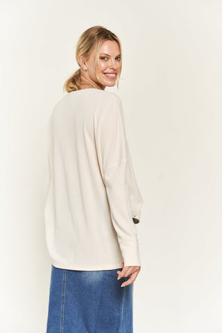 Button down side slit pullover knit top  *Online Only* - Premium  at Lonnys NY - Just $79.63! Shop Womens clothing now