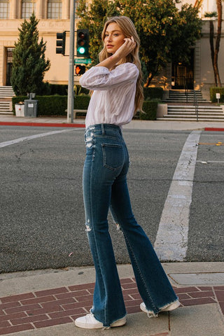 High Rise Distressed Raw hem Flare  *Online Only* - Premium  at Lonnys NY - Just $91! Shop Womens clothing now 
