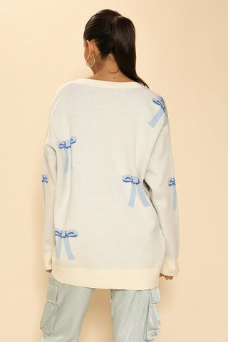 All over bow knit cardigan *Online Only* - Premium  at Lonnys NY - Just $64.68! Shop Womens clothing now 