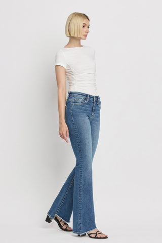 High Rise Slant Hem Flare Jeans *Online Only* - Premium clothing at Lonnys NY - Just $84! Shop Womens clothing now 