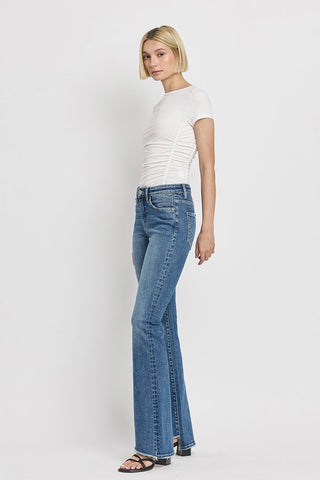 High Rise Slant Hem Flare Jeans *Online Only* - Premium clothing at Lonnys NY - Just $84! Shop Womens clothing now 