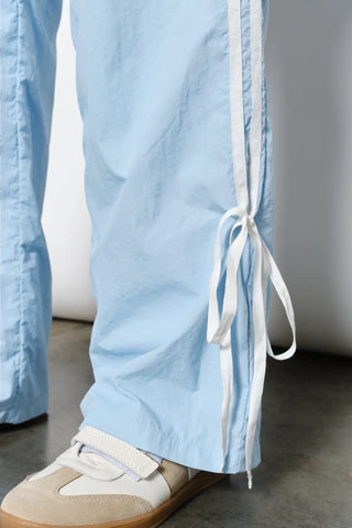 American Poet Dakota Bow Track Pants - Premium clothing at Lonnys NY - Just $74! Shop Womens clothing now 