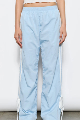 American Poet Dakota Bow Track Pants - Premium clothing at Lonnys NY - Just $74! Shop Womens clothing now 
