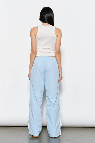 American Poet Dakota Bow Track Pants - Premium clothing at Lonnys NY - Just $74! Shop Womens clothing now 