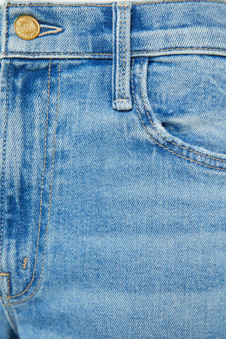 Mother Spinner Zip Sneak Jeans in Glow Up