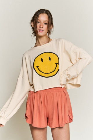 SMILEY FACE LONG SLEEVE CROP TOP *Online Only* - Premium  at Lonnys NY - Just $62! Shop Womens clothing now 